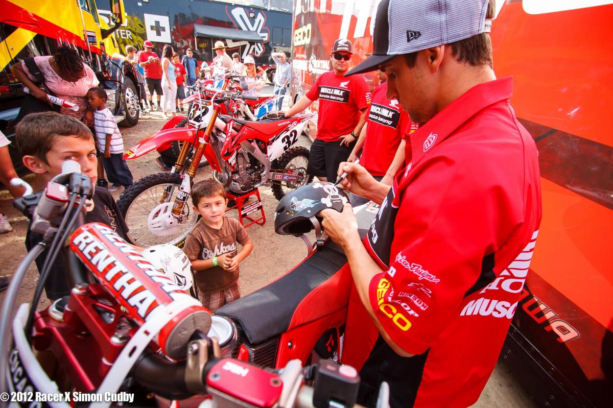 Justin Brayton signs