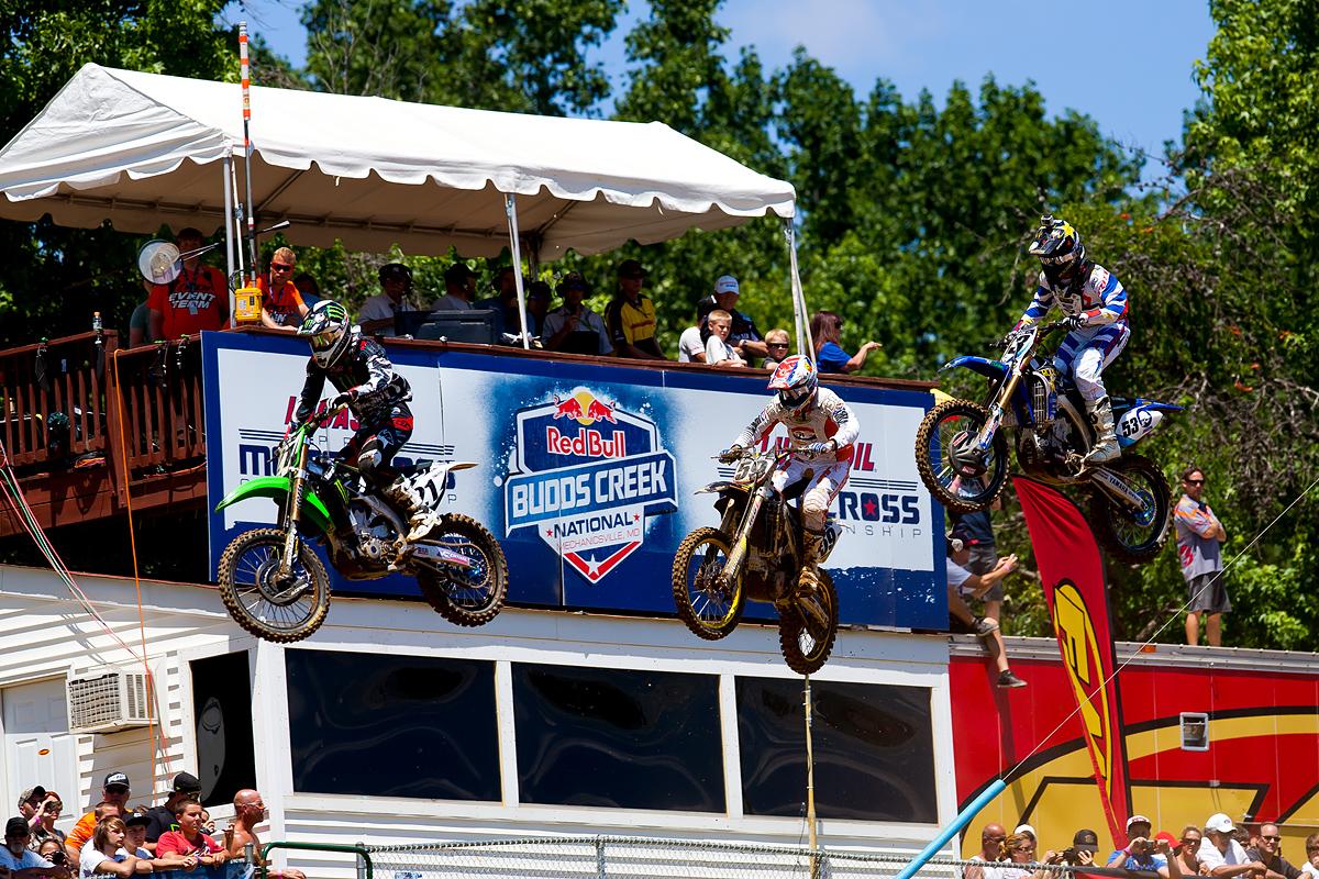 Weimer, Friese, Sipes over the finish line jump after the start.