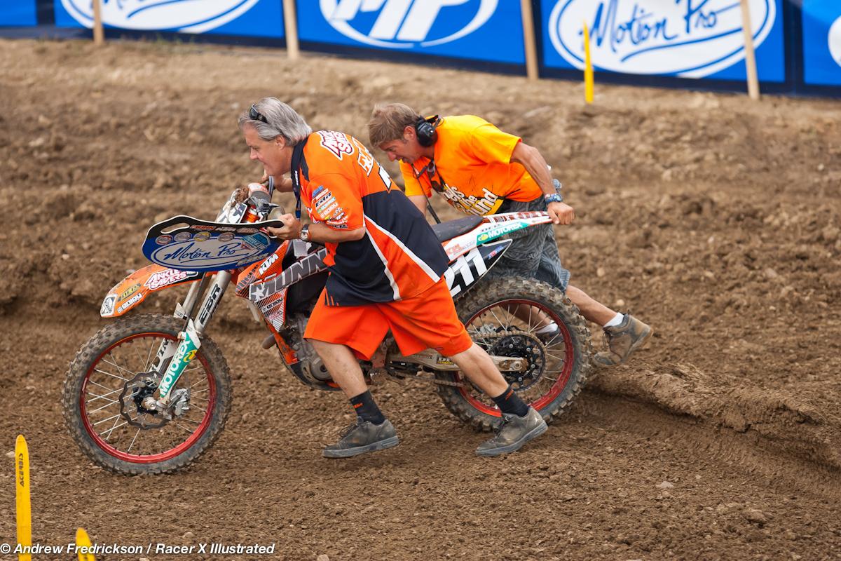 Tevin Tapia's bike pushed off after a crash.