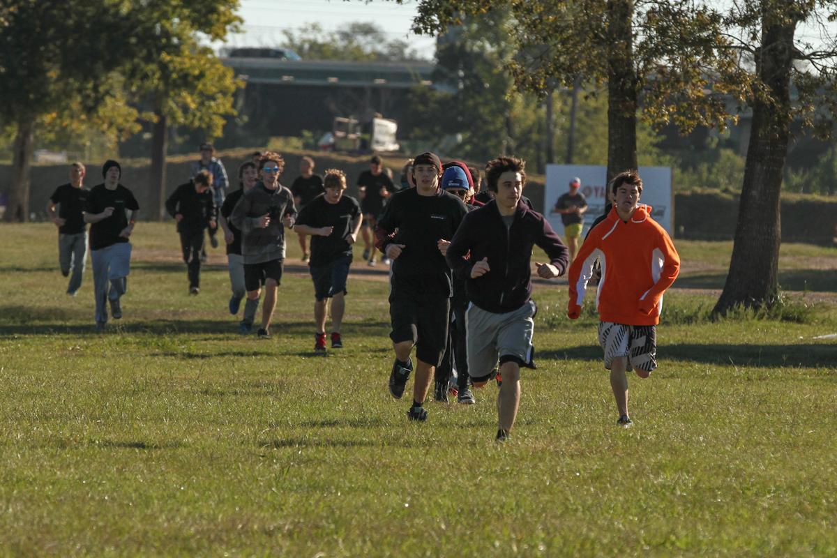 Tryouts started out each day with a warm up jog to the obstacle course