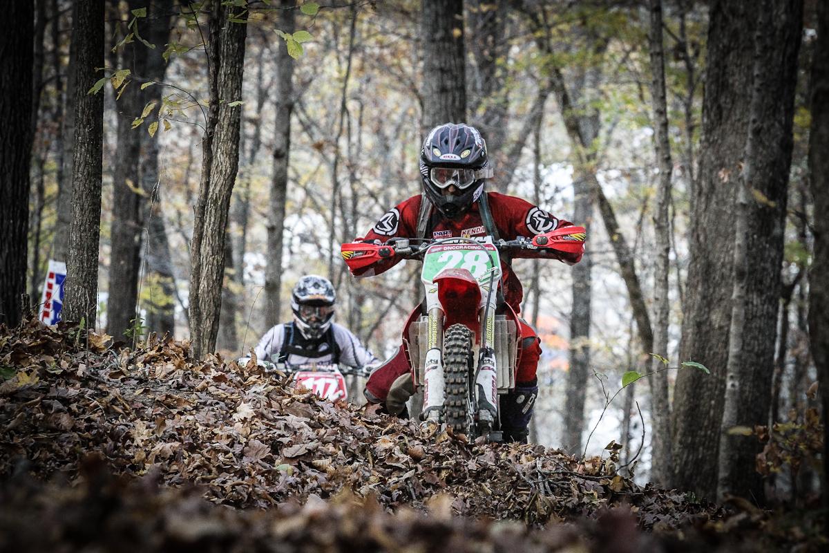 Grills picks his way through the woods.