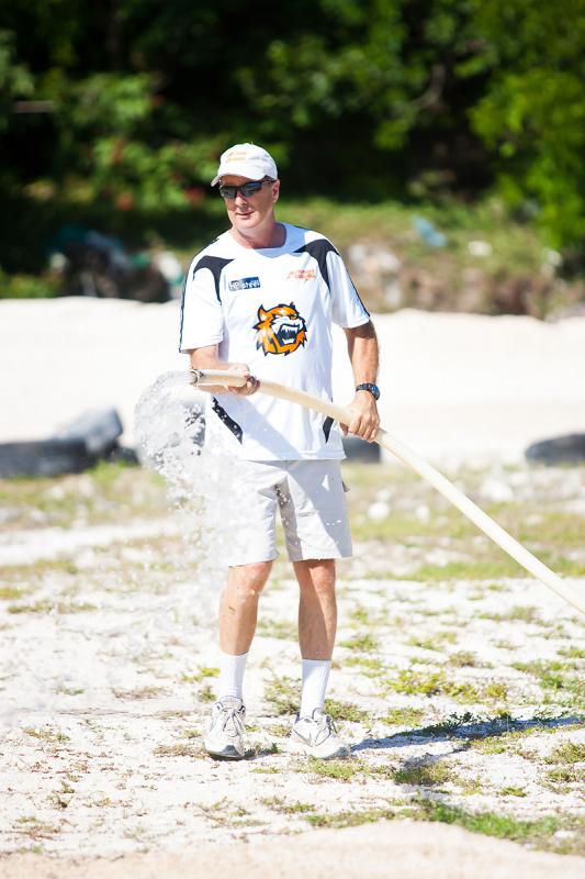 Chris waters the track.