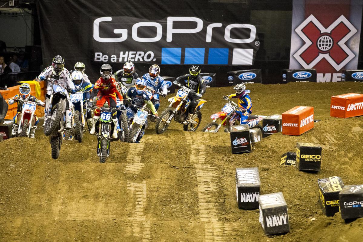 The Women’s Moto X Finals gets underway with Italian rider Kiara Fontanesi grabbing the holeshot and leading the 12-rider pack down the first rhythm section.