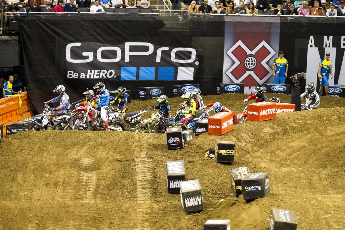 A tiny track with an even tinier start straight wound up spelling chaos for Chad Reed and others as the pack swung wide in the first turn. Josh Hill seized the opportunity and dove under them all to grab the all-important holeshot. 