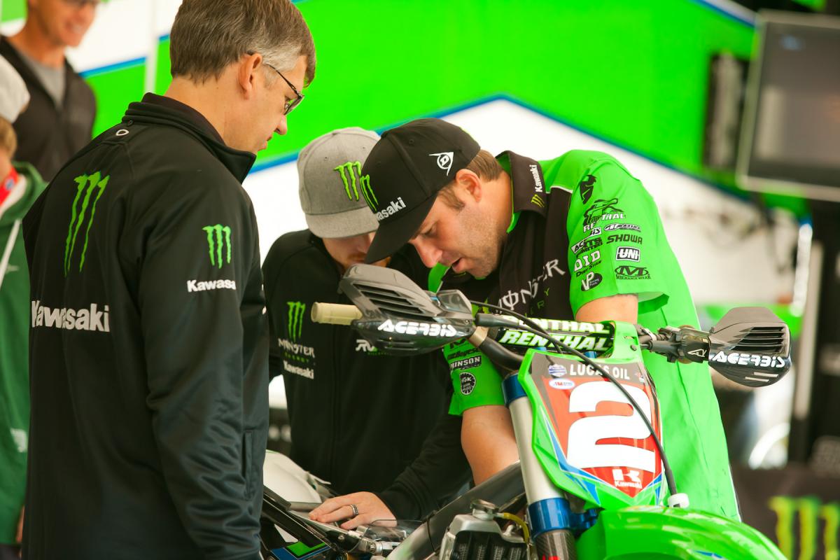 Mike Williamson works on Villopoto's bike.