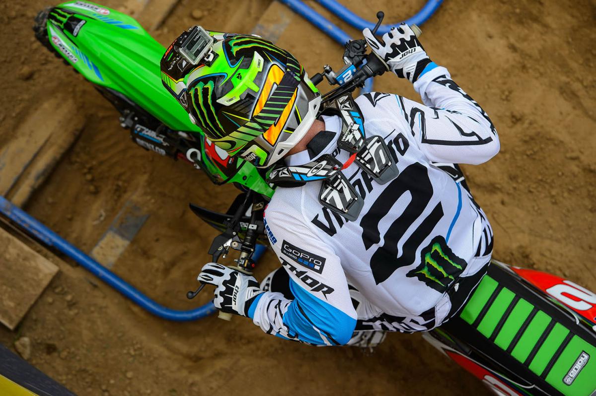 Even though RV's front wheel is already over the gate, look how far forward his head is, and how relaxed his overall demeanor is. He has maintained the exact same posture he held right before the gate dropped. It doesn't look like the pure chaos you'd expect blasting out of the gate on a works 450--just perfect technique.
