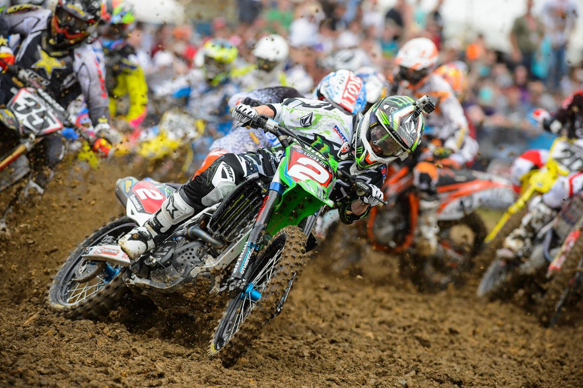 This one became a Renthal ad on the back page of our magazine. Full lock on the right wrist even though the bike is slinging sideways, and he's just crushing the outside peg to make that Dunlop dig. Dig that!
