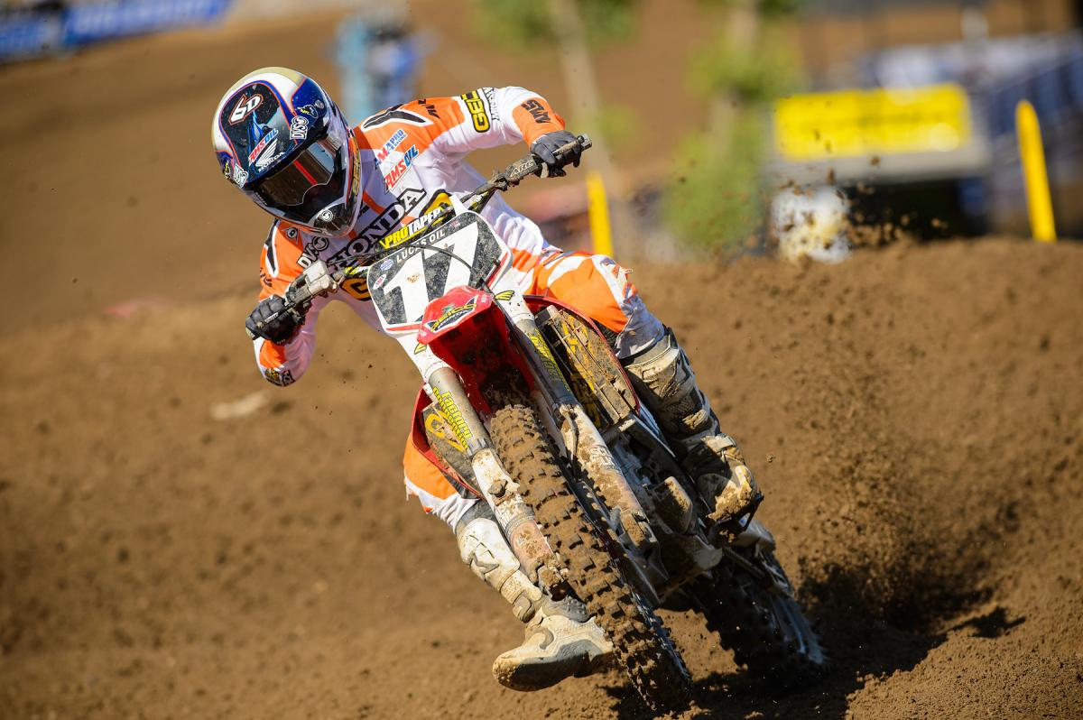 Eli giving it full twist, while also metering things with an index finger on the clutch. He's also using his legs to grip the bike, even with a foot down. Riding coaches often mention Eli's footwork--he's keeping his left foot pointed in and gripping, even while gravity is trying to pull him back and out.