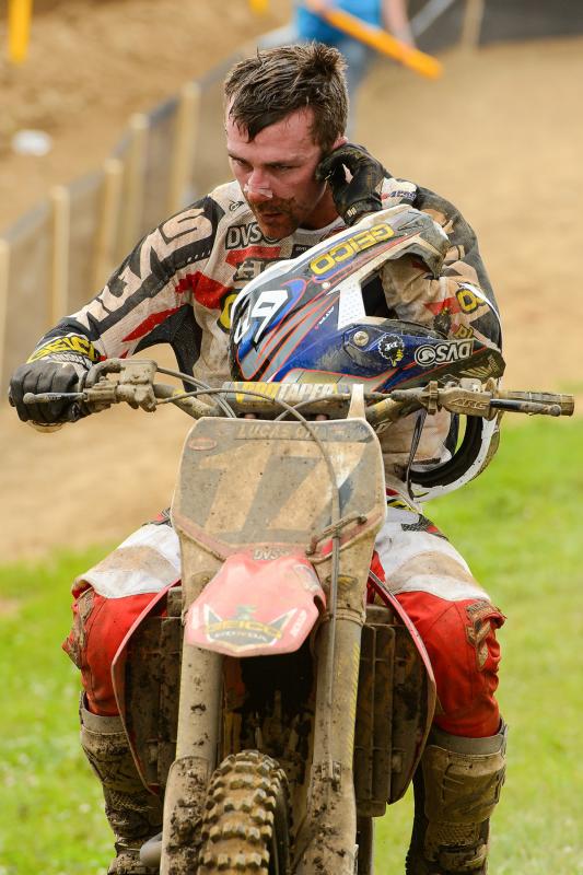 Pretty unique that Eli runs ear plugs while he's riding. Here he removes them so he can hear the RedBud crowd even better.