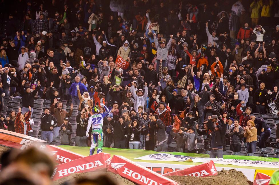 Reed celebrates with the fans in Anaheim. 
