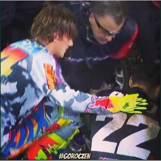 Ken Roczen checking on Chad Reed following his crash Saturday. 