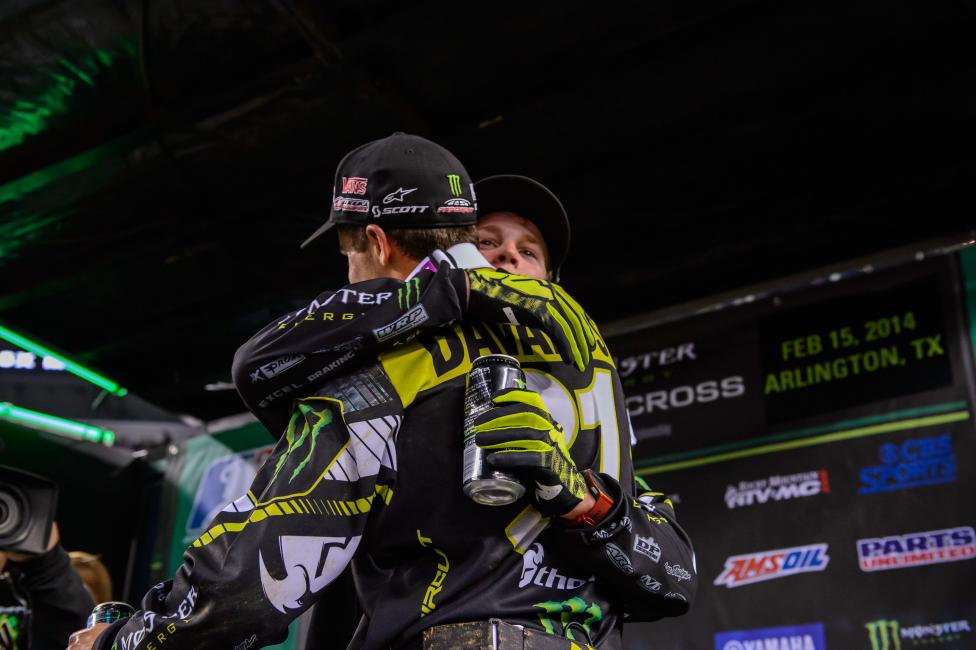 AC and Davalos celebrate on the podium.  