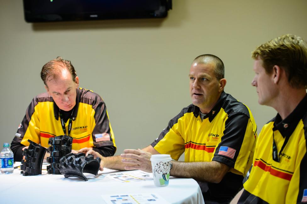 Dunlop's (left to right) Mike Buckley, Brian Fleck and Broc Glover with cutaways of the 762, 52 and 32 tires.