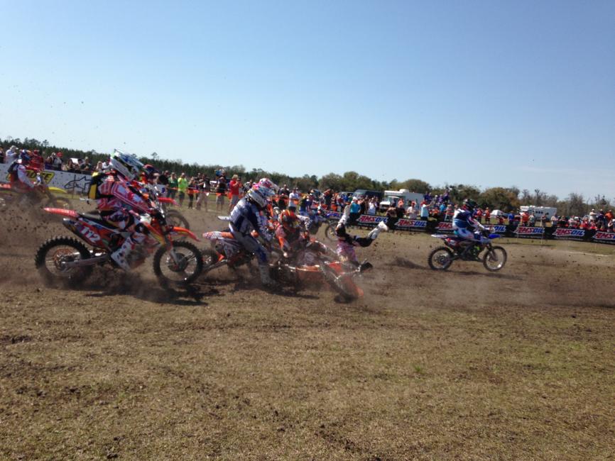 Charlie Mullins got up from this first-turn crash to win the opening round of the 2014 Amsoil GNCC Series in Florida.