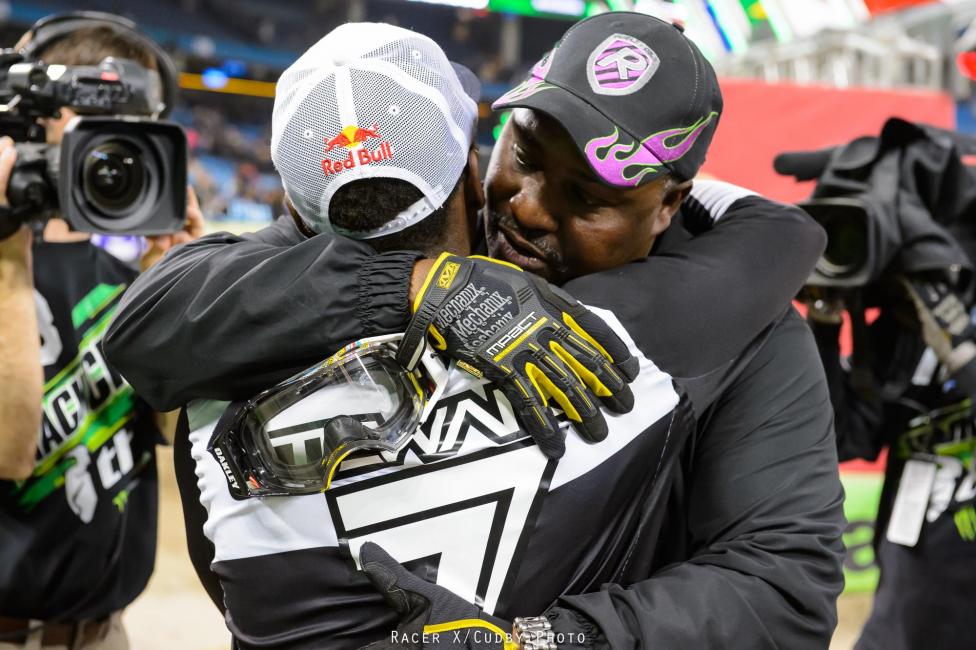 James junior and senior share a classic father and son moment following the race.
