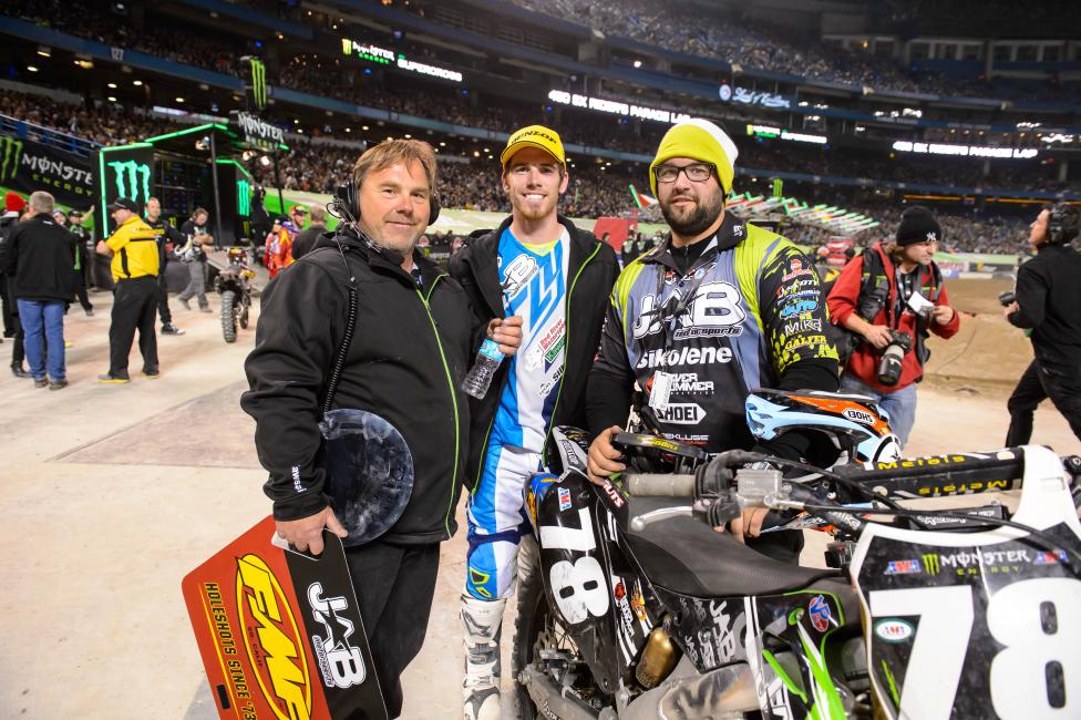 Lemoine shares the special moment with his father (left) and mechanic. 