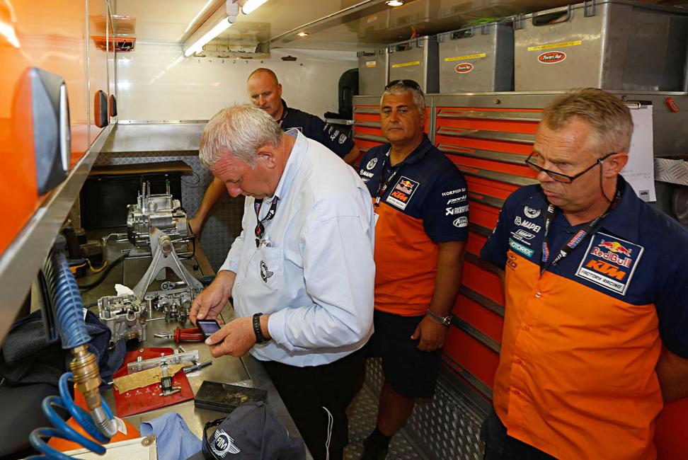 Cairoli's bike going through inspection. 