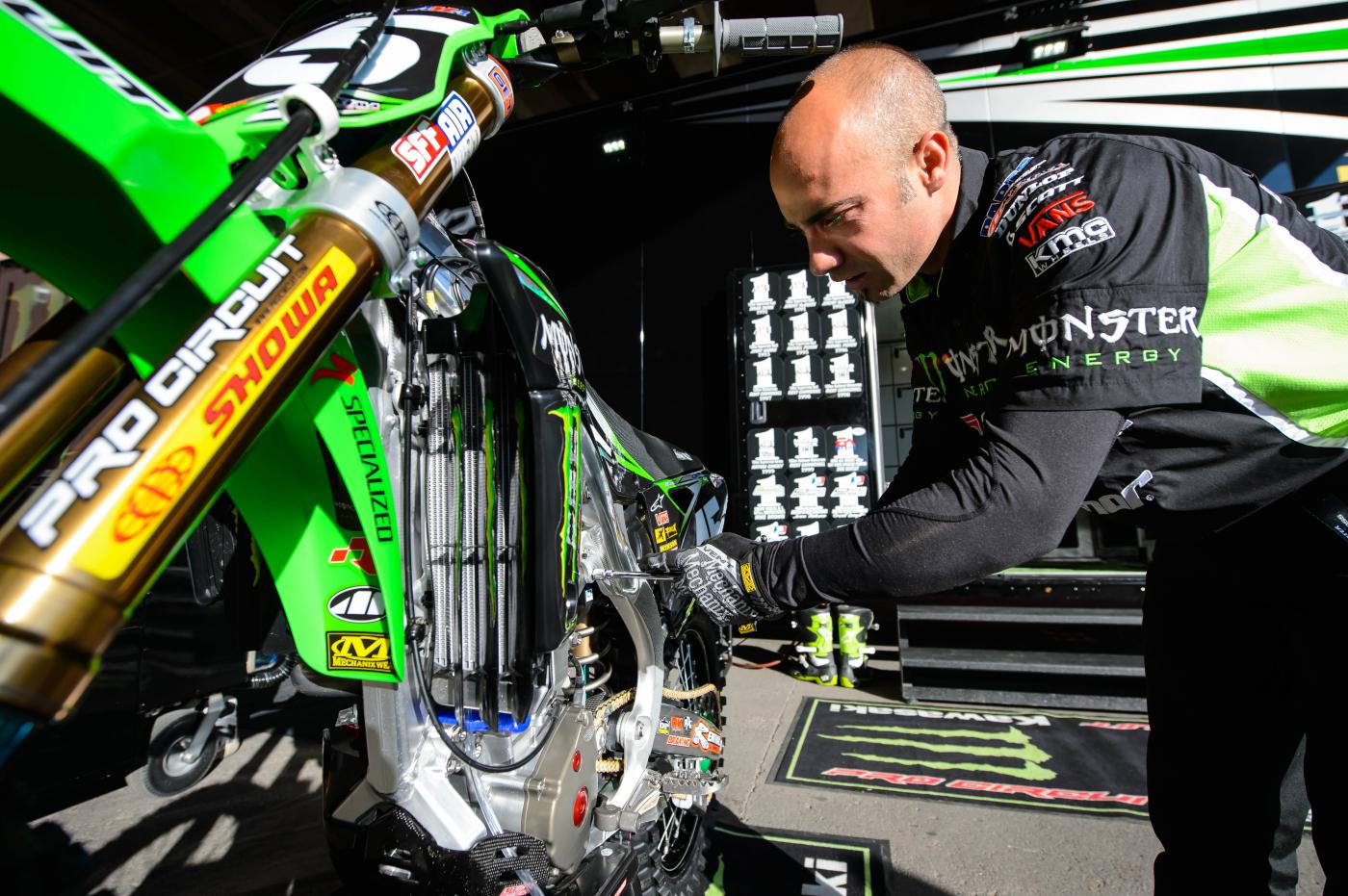 John Primo spins wrenches for Darryn Durham.