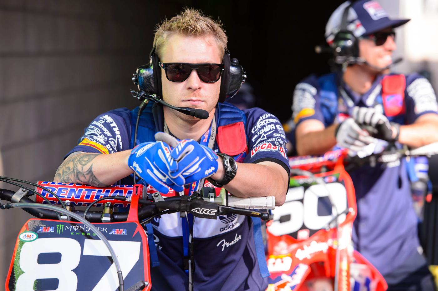 Jordan Troxell gets Shane McElrath's bike ready. 
