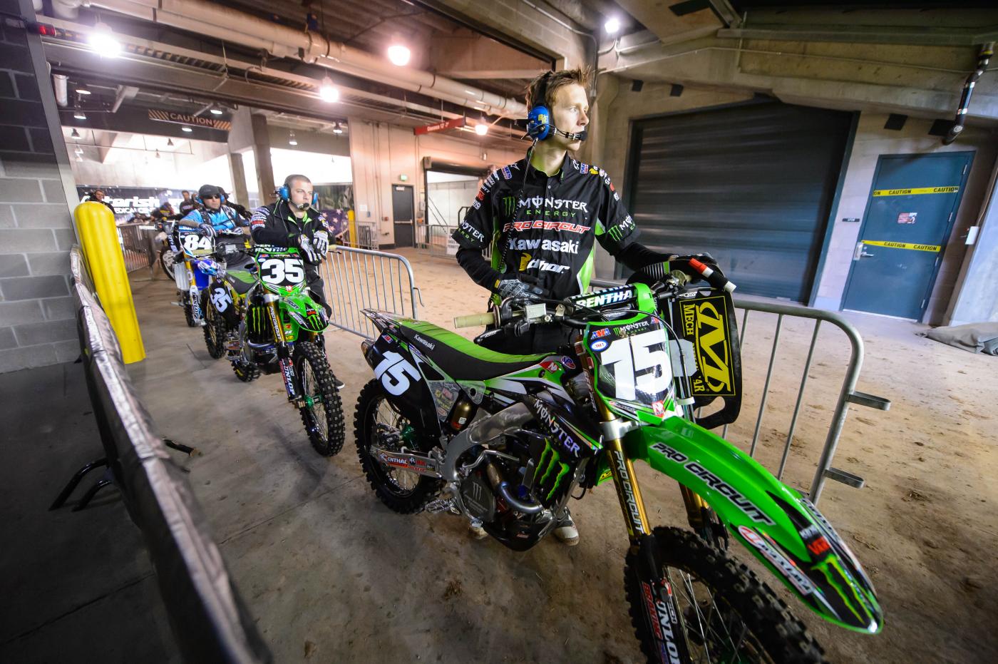 Ollie Stone rolling out Dean Wilson's bike.