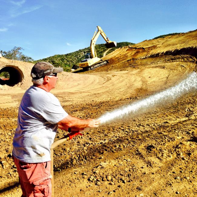 Yes, that's Jody Weisel out there watering.