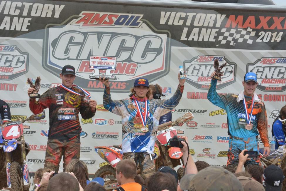 Kailub Russell (center) is the new XC1 points leader following his win on Sunday. 