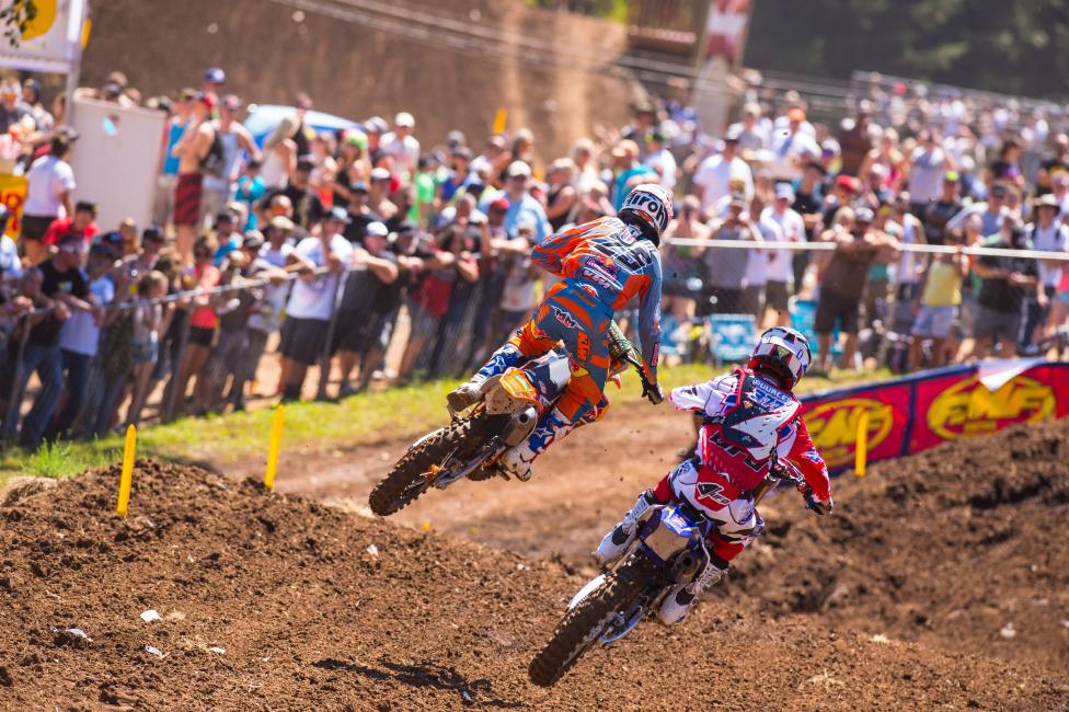Marvin Musquin (25) battles with fellow French rider Christophe Pourcel at Washougal. 