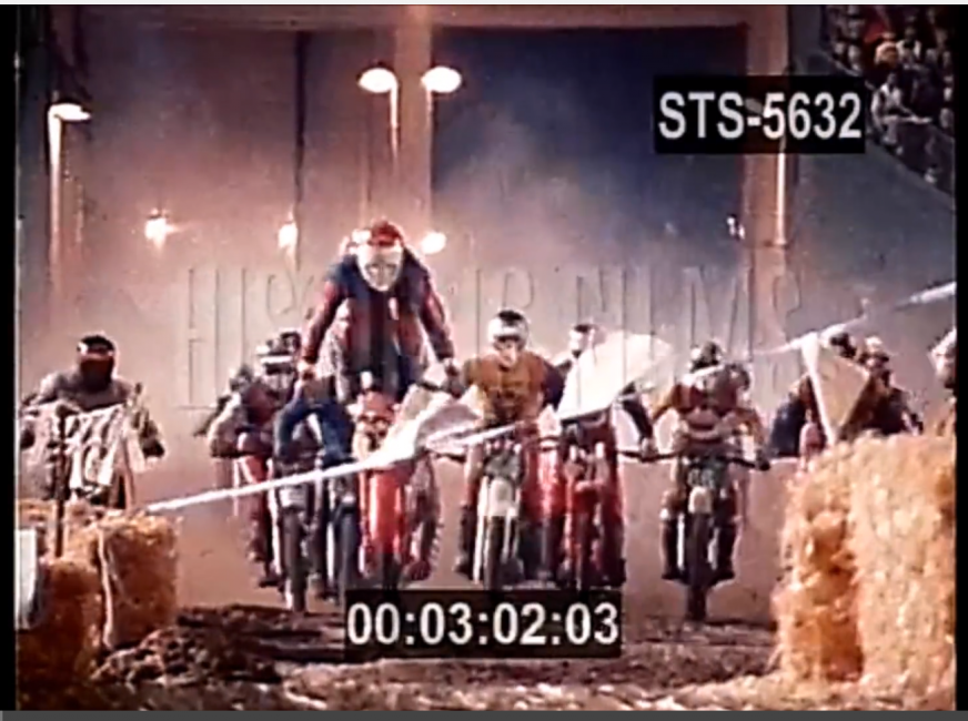 Tony DiStefano switched from CZ to Suzuki in 1975 but rode the 500 Class indoors (and his first factory mechanic standing on the right is current Yamaha boss Keith McCarthy).