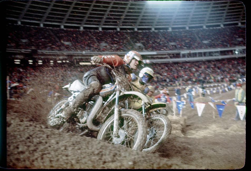 Marty Moates pins his Ossa around the outside at the muddy Atlanta SX.