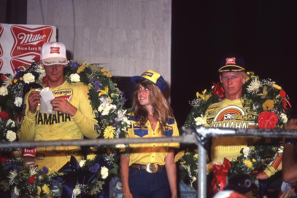 Coliseum winner Mike Bell (left) gets a glance from Miss Wrangler while Broc Glover looks forward to the last round. 