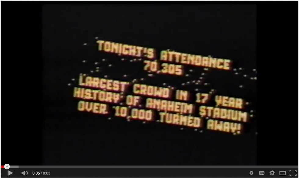 Defending champ David Bailey hoists one of his many bonus checks. 