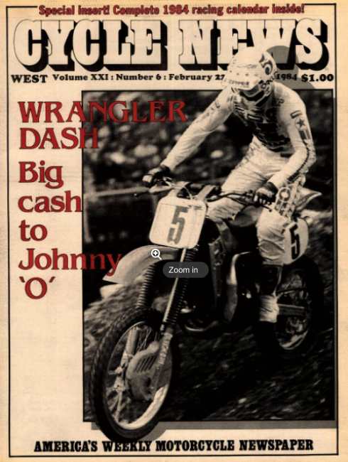 Defending champ David Bailey hoists one of his many bonus checks. 