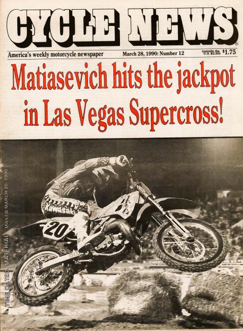 Defending champion Jeff Stanton graced the cover of the 1990 AMA/Camel Supercross program.