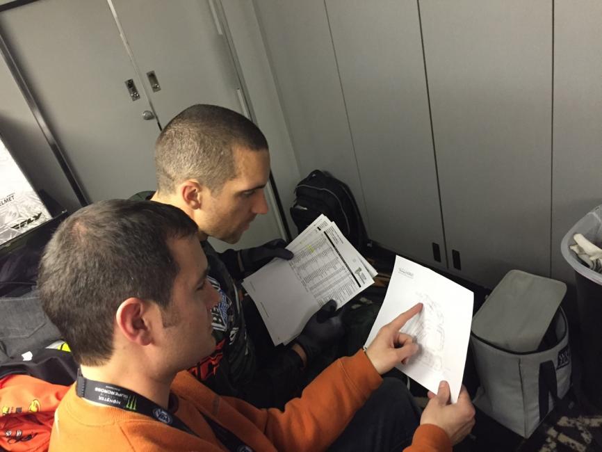 Weege and Brayton studying lines. 