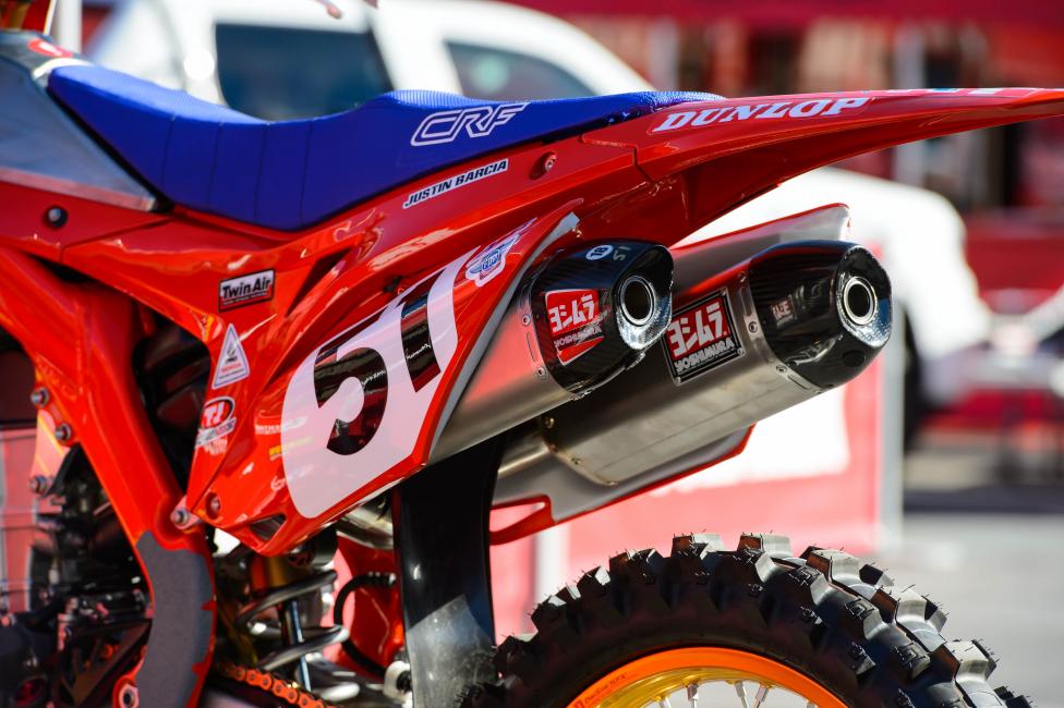 No twin shock but at least twin mufflers. 