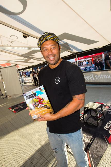 Pro surfer Sunny Garcia checking out the latest issue of Racer X Illustrated. 