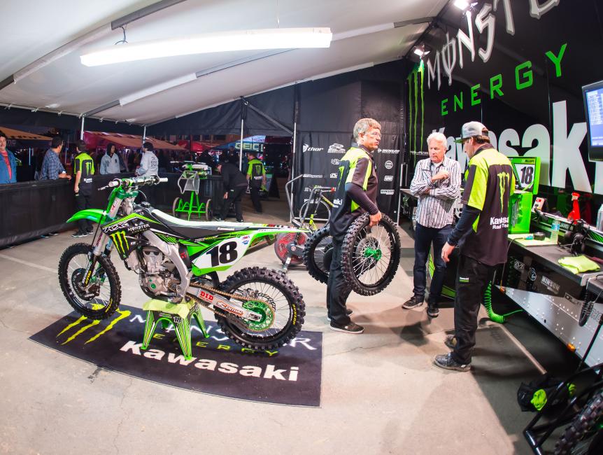 Lockwood (holding the tires) has had to adjust from the road racing culture to the motocross world. There could be even greater technology on the horizon, but dirt bikes require very specific parameters. 