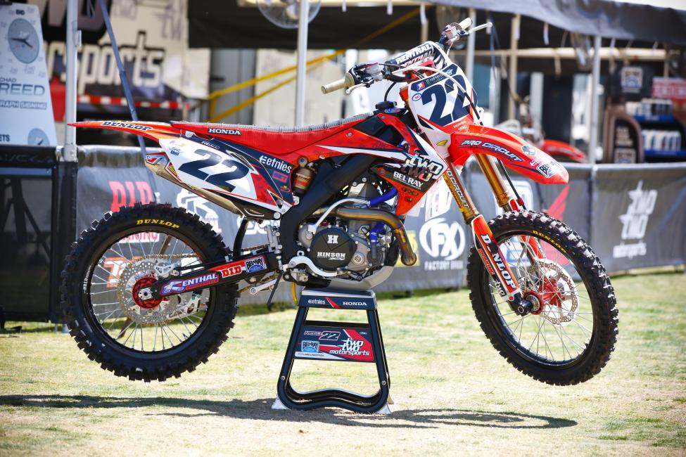 Las Vegas usually sees some special looks, so let's get warmed up there. Here's Chad Reed tuning up his Honda with an all-black frame and swingarm.