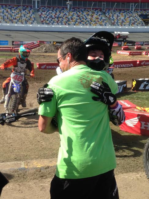 Joey Crown gets a big hug after a RCamSX win.