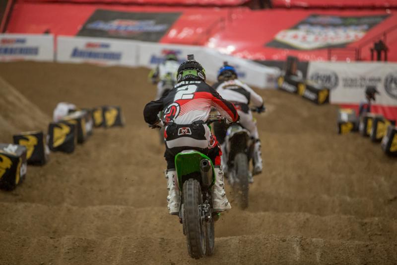 Hayes tried to knock Regal down at the start of the second main event, and the move backfired. 