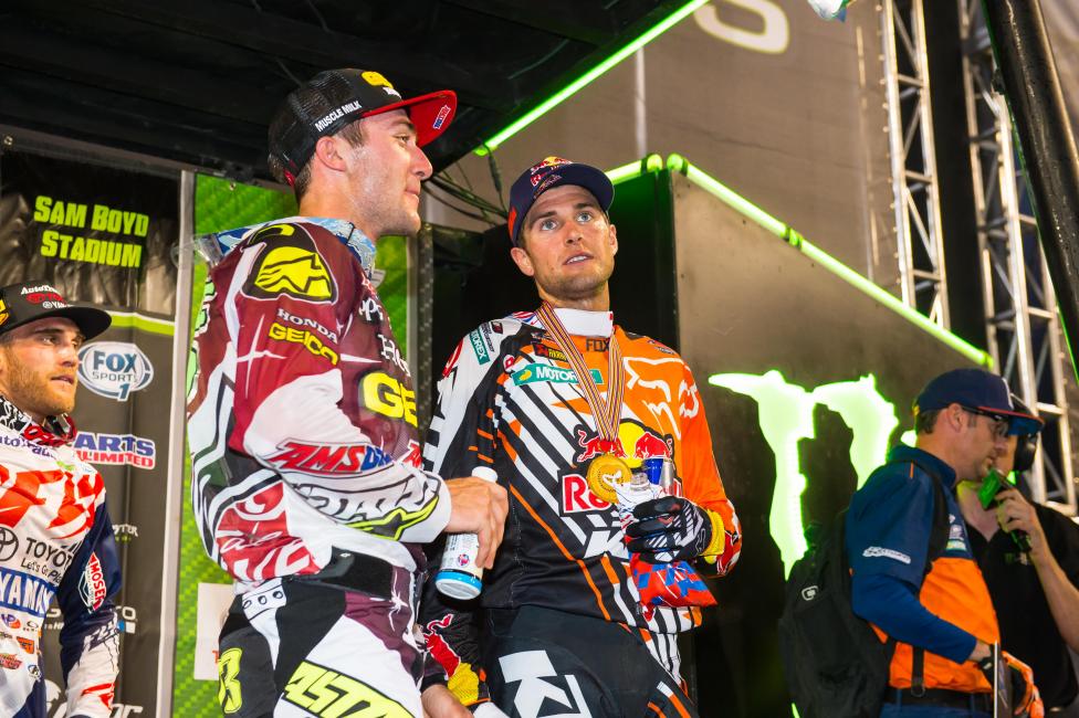 Bench racing on the podium.