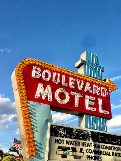 ...While his brother Alex shoots straight down the middle and rides wide around the outside of the exit.