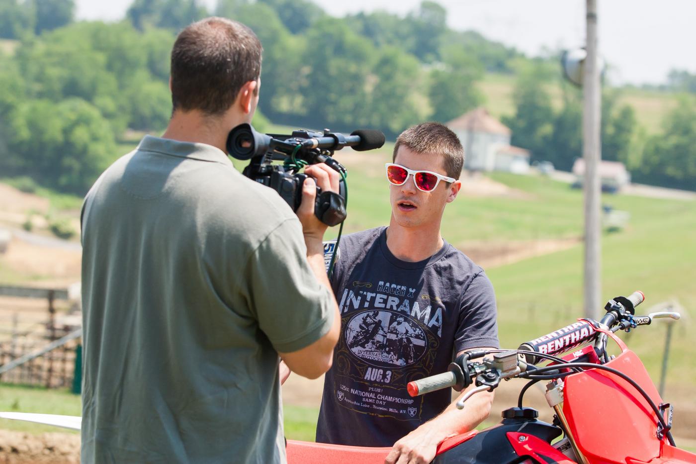 Charles Bright talks with local media.