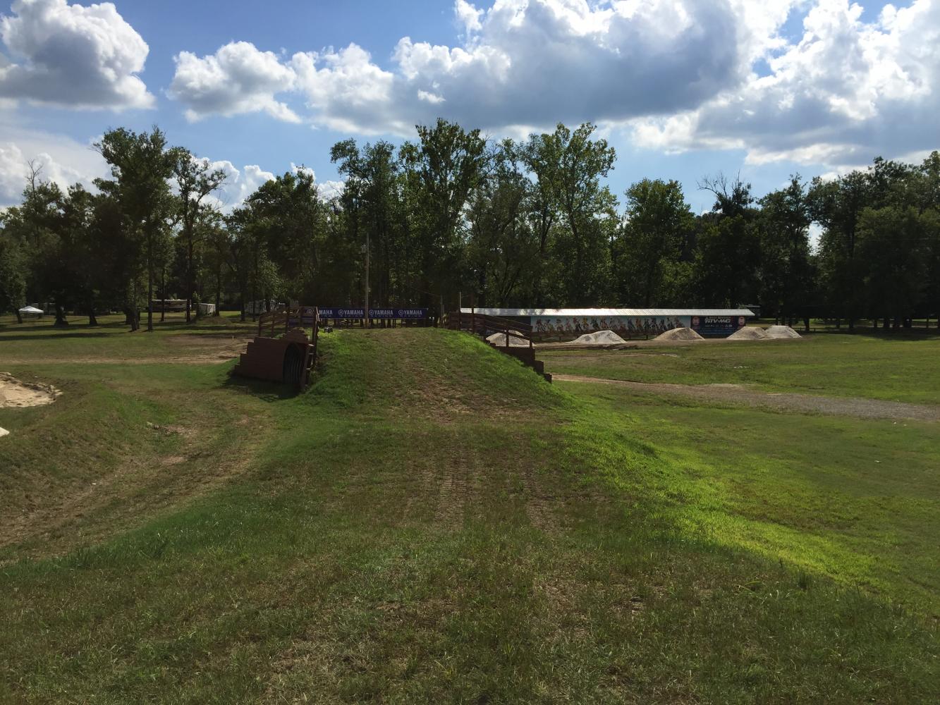 The grass will be gone before any bikes get on the track, but it sure looks cool now. No one is allowed to ride or practice here during any other time of the year in order to keep the playing field as even as possible for everyone.