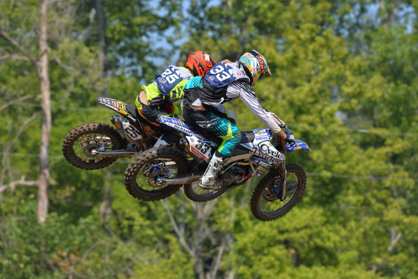 Benny Bloss (33) and Josh Mosiman (25) battle in Open Pro Sport. Bloss took a third.