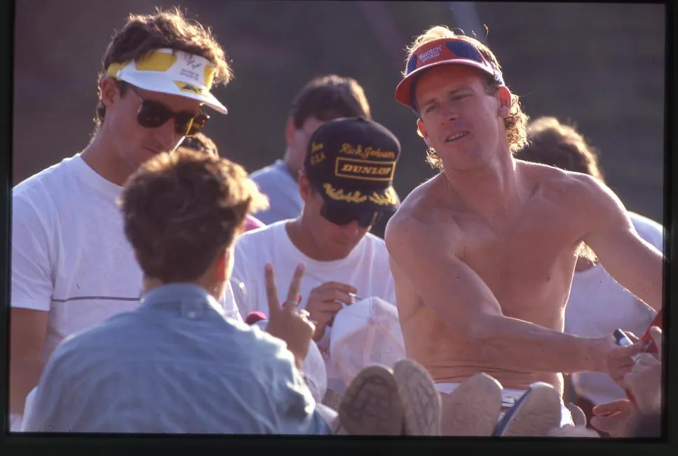 David Bailey (left) and a shirtless Johnny O&rsquo;Mara (right) lead an autograph session with Rick Johnson behind them in the Dunlop hat.