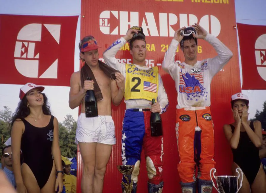 With O&rsquo;Mara on the left, RJ (2) in the middle, and David Bailey taking his goggles off after a champagne shower, Team USA 1986 was the pinnacle of a remarkable thirteen-year winning streak.