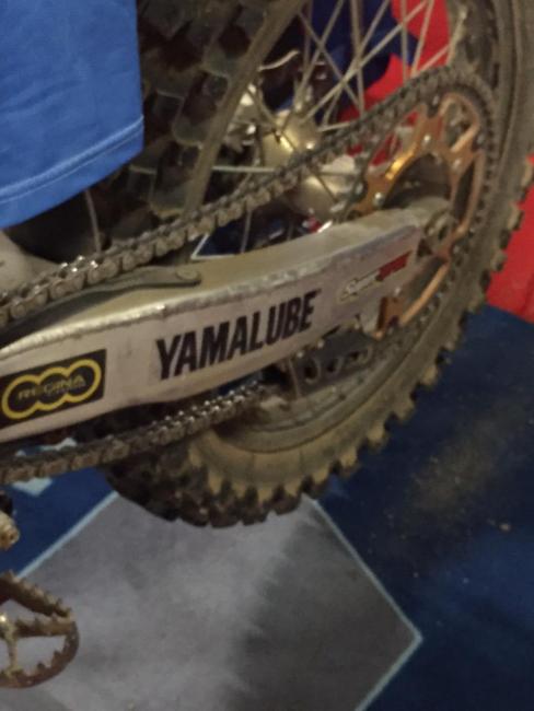 I’ve never seen this before: Romain Febvre’s bike has the standard swingarm on his Yamaha YZ450F made stiffer by cutting another swingarm and then welding it on top of the existing one. Febvre told me for motocross purposes it’s stiffer and allows the rear end to track better.