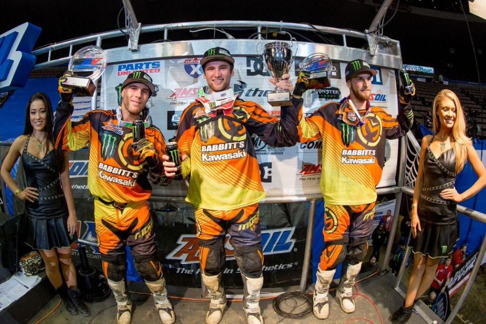 Faith (center) won the opening night over teammates Chris Blose (left) and Jacob Hayes.