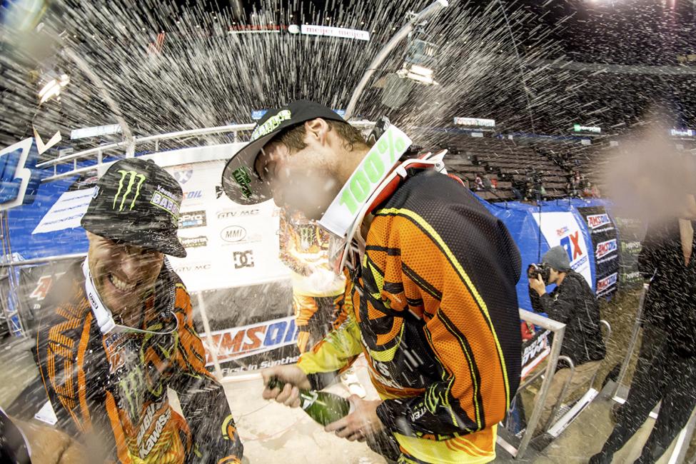 Faith celebrates his win with teammate Chris Blose.